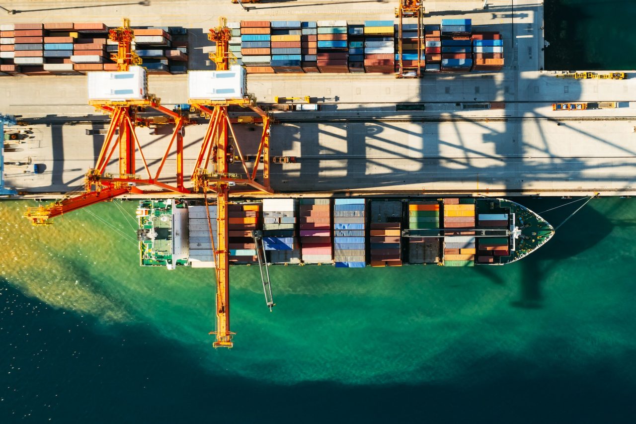 Aerial View Of Containers Loading And Unloading To The Ship In The Sea Port Logistic And.jpg