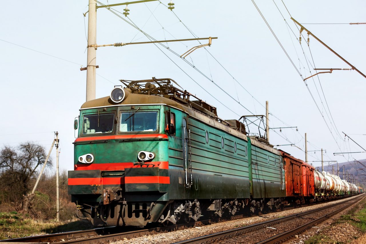Front Of Old Train Crossing Railway And Transporting Goods Carriage Transportation Concept.jpg